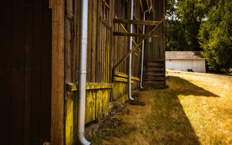 Barn with gutters and downspouts, roofing in Esko, MN