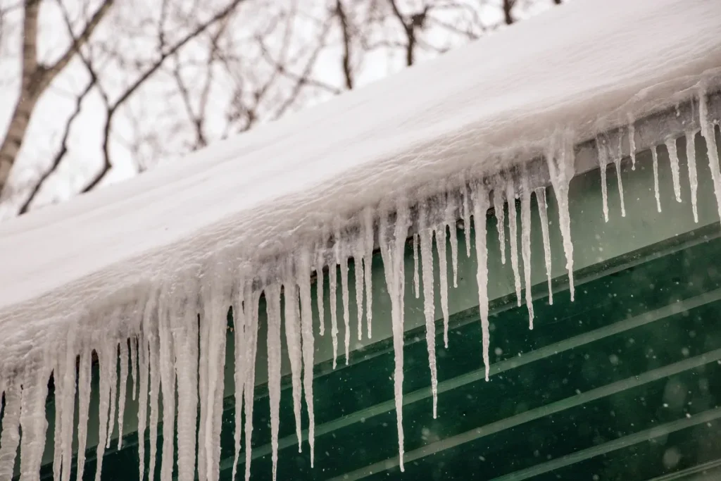 How to Stop Ice Dams on Your Duluth Roof (and Why Chipping Ice Never Works)