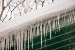 How to Stop Ice Dams on Your Duluth Roof (and Why Chipping Ice Never Works)