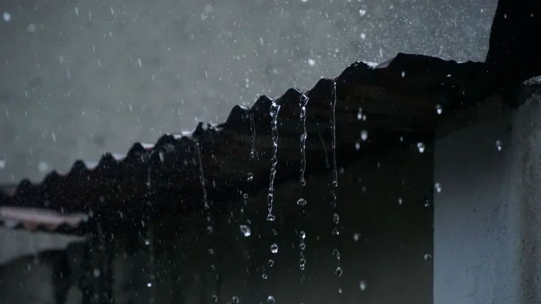 Water running off a roof edge, a common leak source, roof repair in Duluth, MN