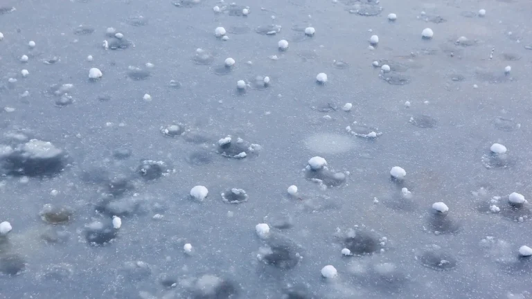 Hailstones after a heavy storm, storm damage roof repair in Duluth, MN